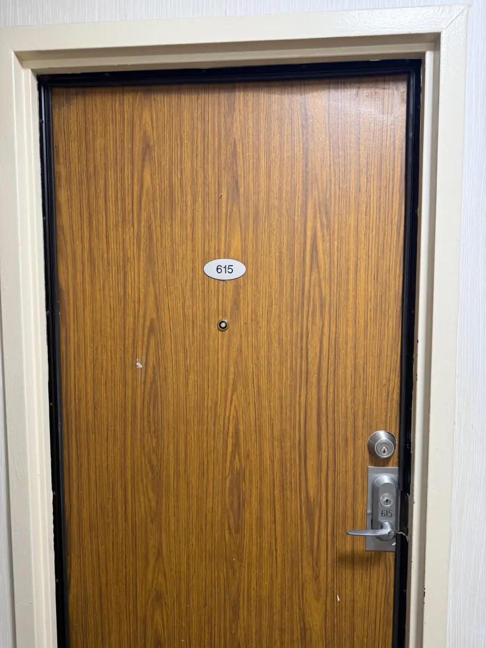 Unit 615 door with the keypad lock handle