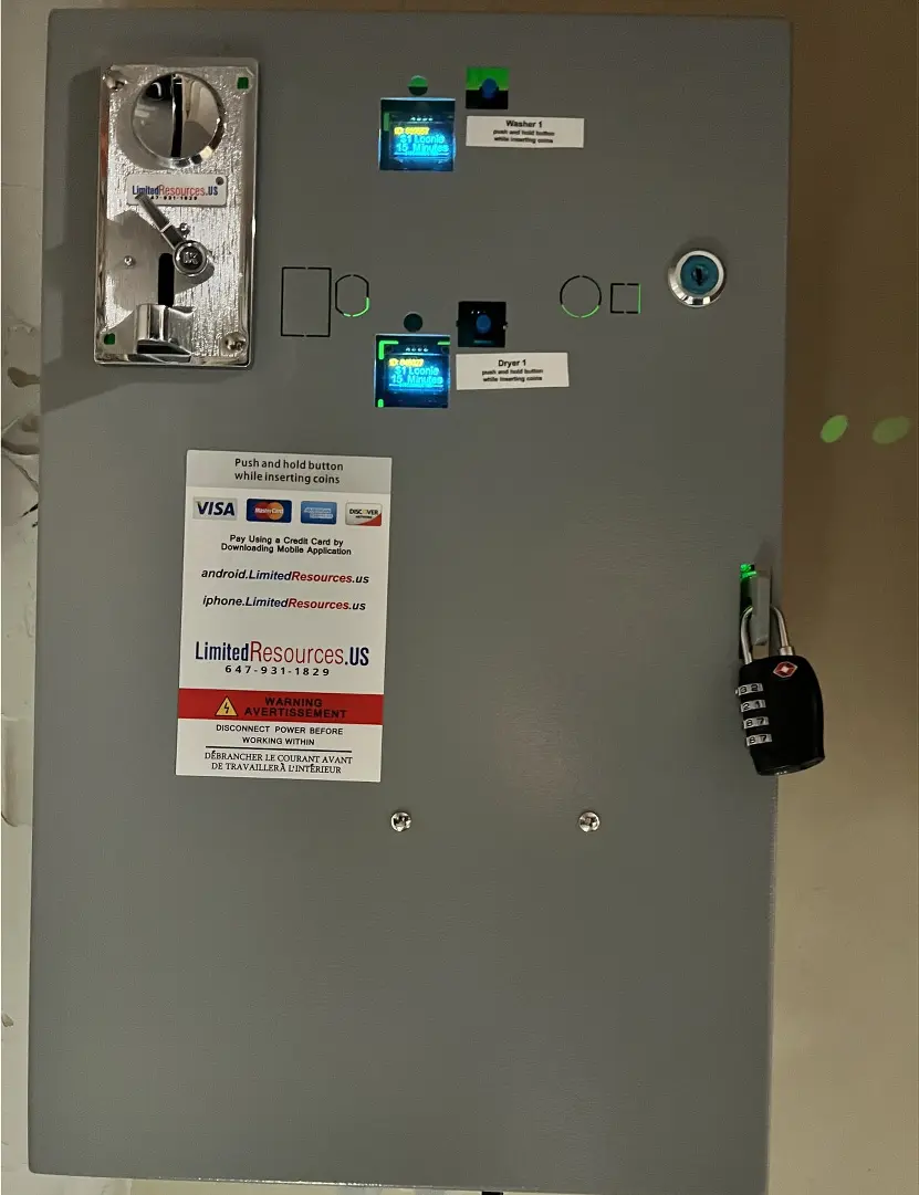 Laundry payment box. 1. Hold the Washer button. 2. While holding the Washer button, insert tokens. 3. Push the coin slider on the washing machine (it does not require coins).