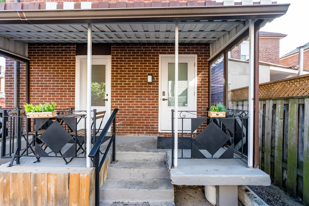 Front porch of 226 Nairn. Your entrance is the white door on the right.