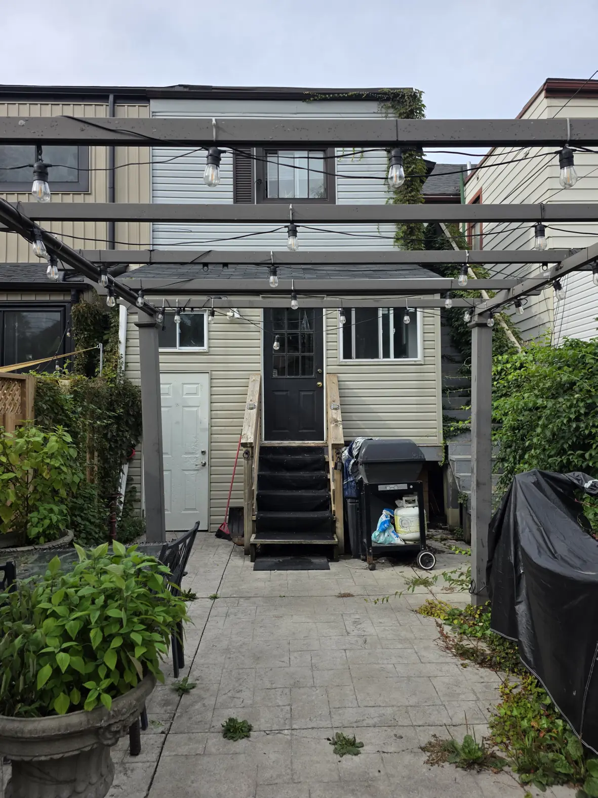 Backyard: the back door is unlocked, and the lockbox for the patio door is beside the stairs.