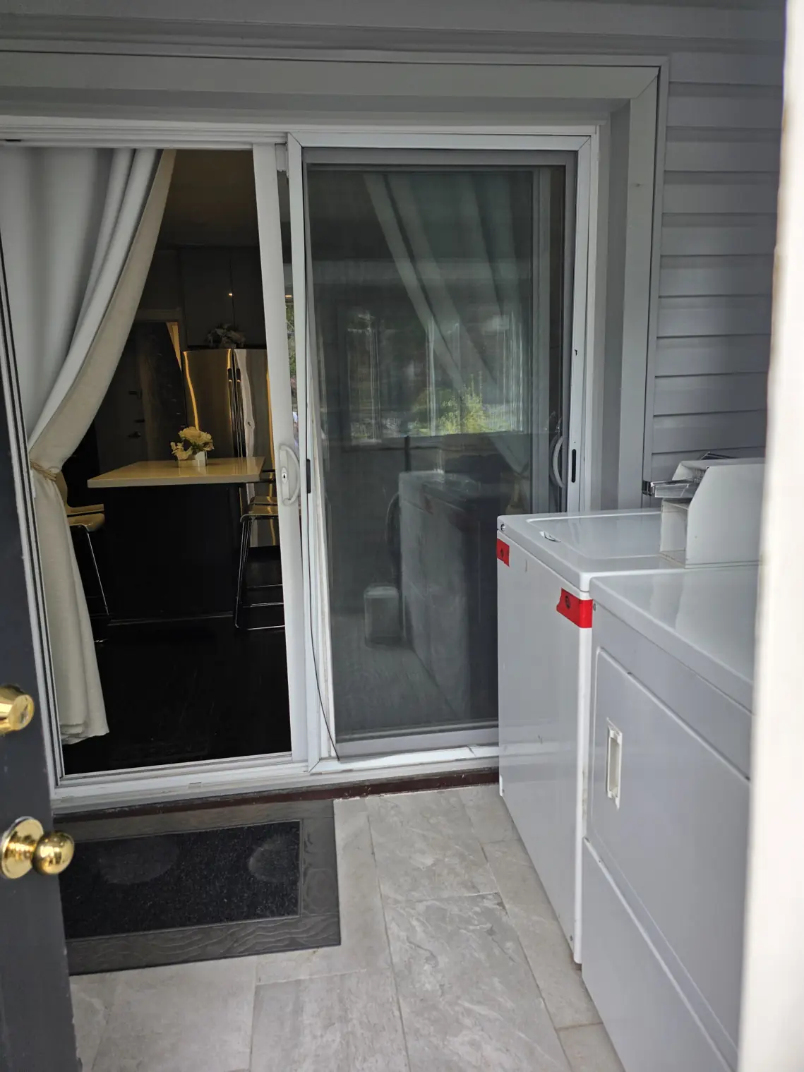 Patio sliding door, your entrance. Use your key to unlock.